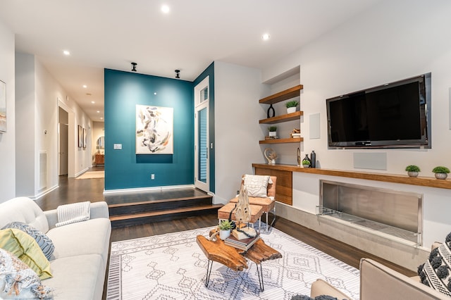 living room with dark wood-type flooring