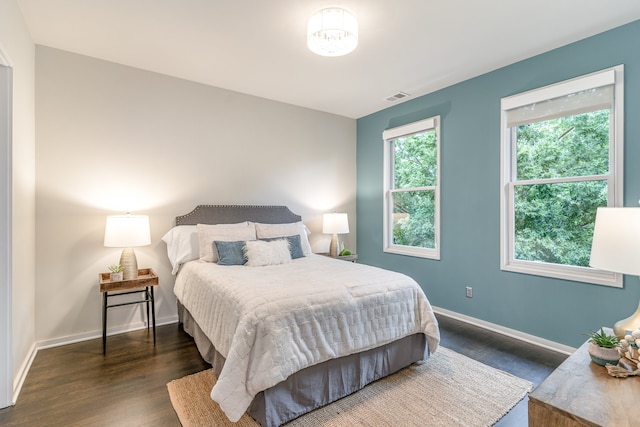 bedroom featuring dark hardwood / wood-style floors