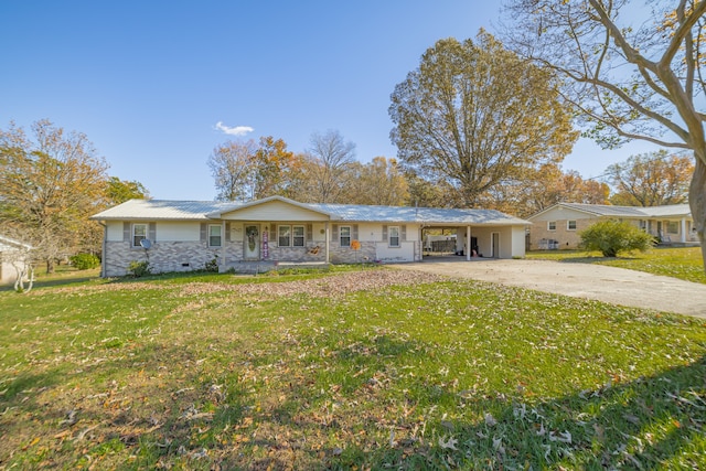 ranch-style home with a carport, a porch, and a front lawn