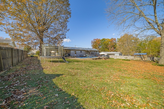 view of yard with a trampoline