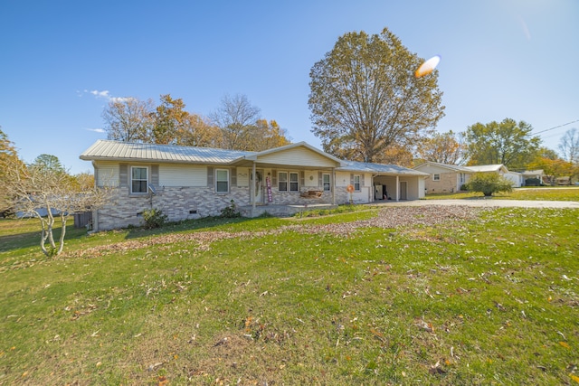 ranch-style home with a carport and a front yard