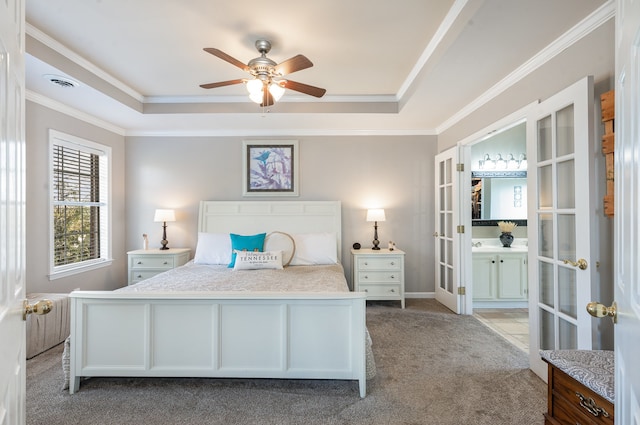 carpeted bedroom featuring french doors, ensuite bathroom, crown molding, ceiling fan, and radiator heating unit