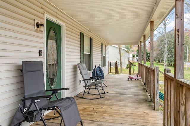 wooden deck featuring a porch