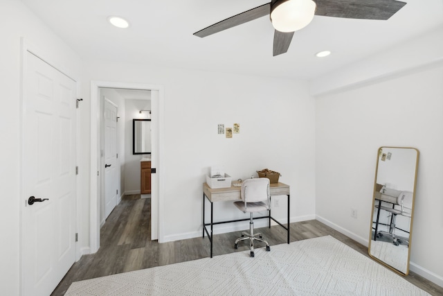 office area featuring ceiling fan and dark wood-type flooring