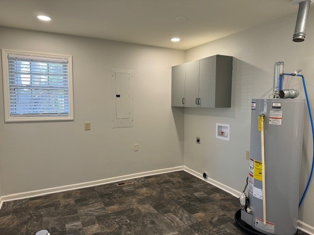 laundry area featuring cabinets, gas water heater, washer hookup, electric dryer hookup, and electric panel