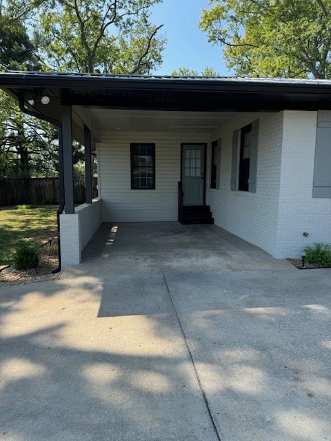 view of front of property with a carport