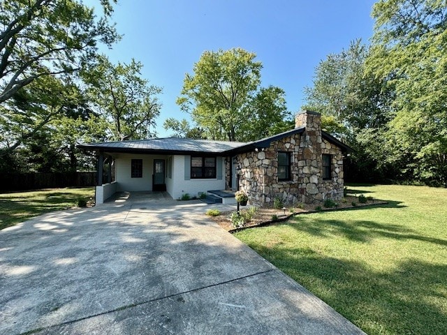 view of front of home with a front yard