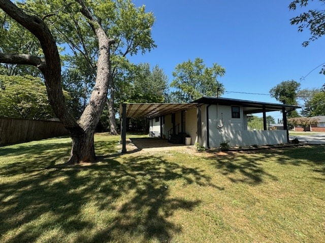 exterior space featuring a carport