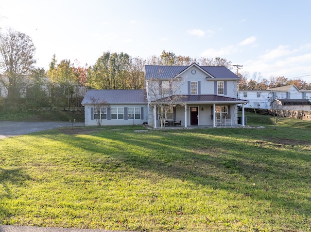 view of front facade with a porch and a front lawn