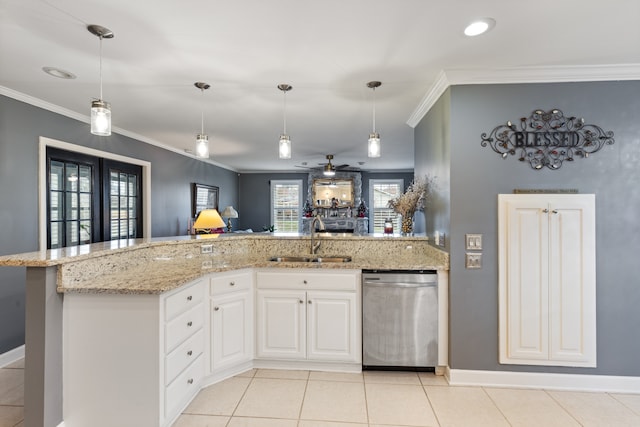 kitchen featuring ceiling fan, sink, stainless steel dishwasher, white cabinets, and ornamental molding