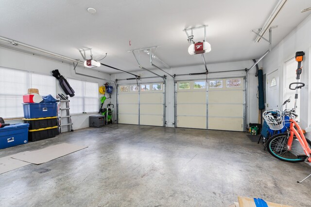 garage featuring a garage door opener