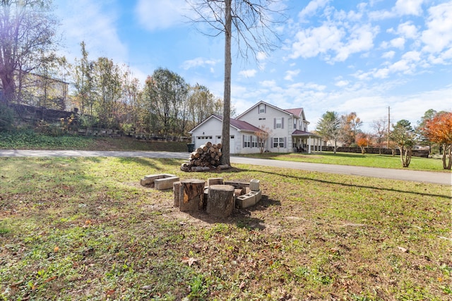 view of yard featuring a garage