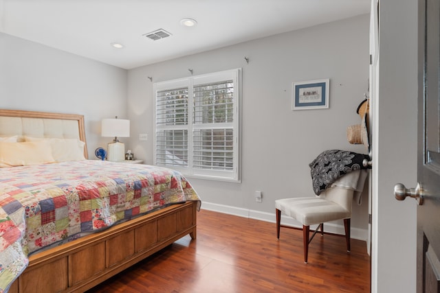 bedroom featuring dark hardwood / wood-style floors