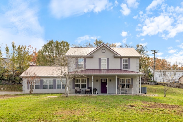 view of front of home featuring covered porch and a front yard