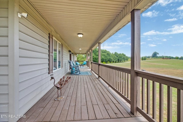 wooden terrace with covered porch