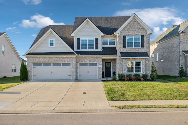 craftsman-style house with a garage and a front yard