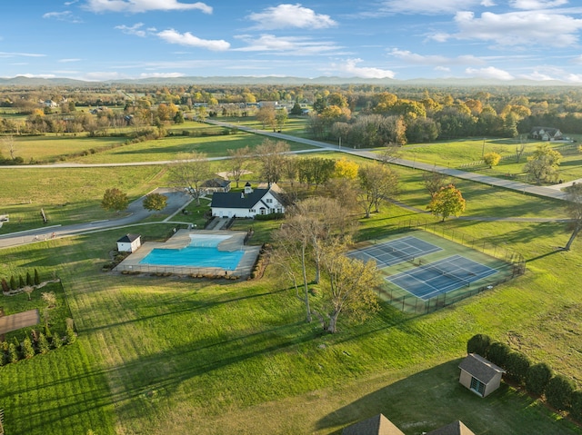 birds eye view of property featuring a rural view