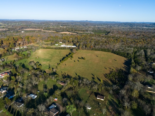 birds eye view of property featuring a rural view