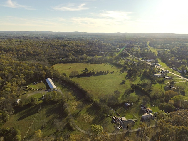 birds eye view of property featuring a rural view