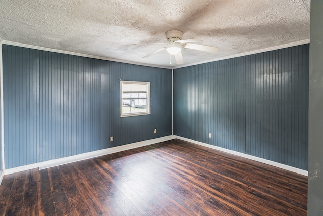 spare room featuring ceiling fan, wood-type flooring, a textured ceiling, and ornamental molding