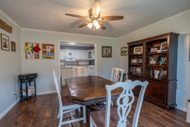 dining space featuring dark hardwood / wood-style floors, ceiling fan, and ornamental molding