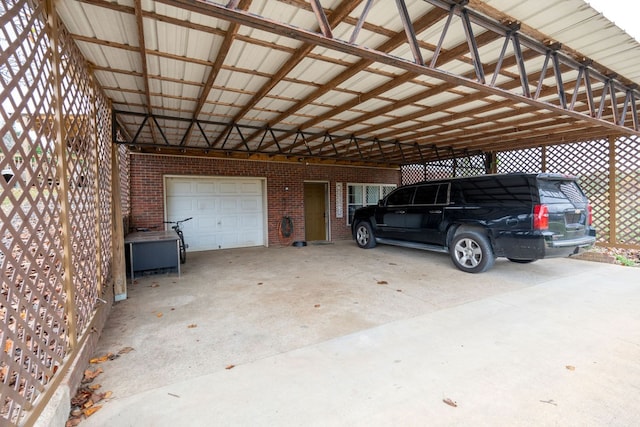 view of car parking with a garage and a carport