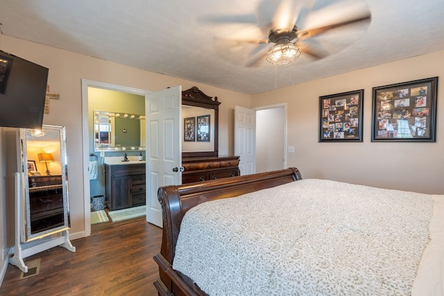 bedroom featuring ensuite bathroom, ceiling fan, and dark hardwood / wood-style floors