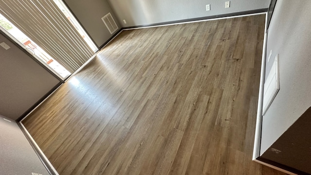 details with hardwood / wood-style flooring