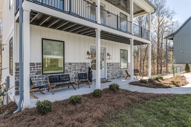 property entrance with a balcony