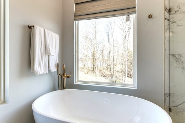 bathroom with a tub