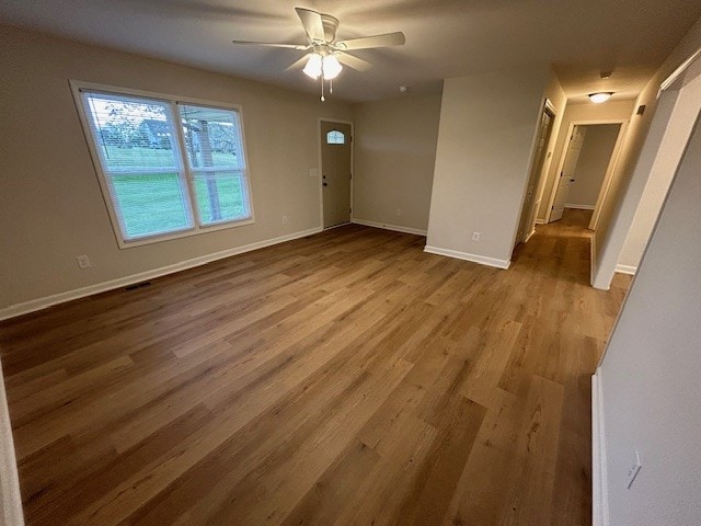 interior space featuring light hardwood / wood-style floors and ceiling fan