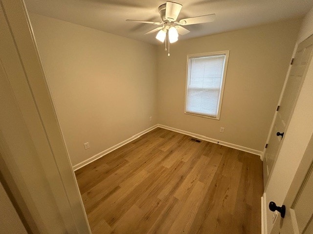 unfurnished bedroom with light wood-type flooring and ceiling fan