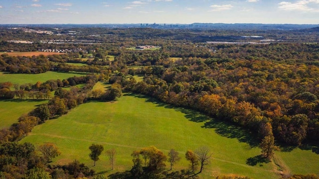 birds eye view of property with a rural view