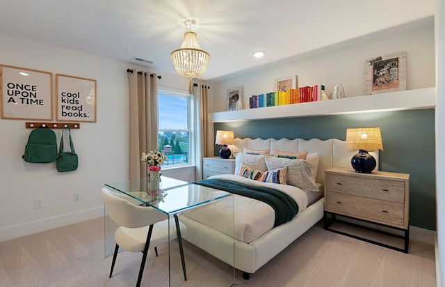 carpeted bedroom featuring a notable chandelier