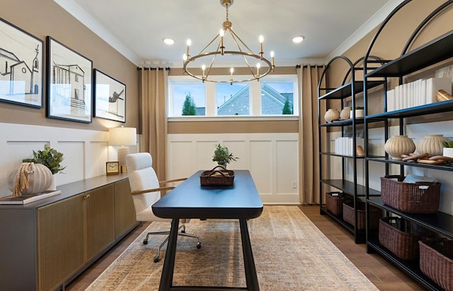 office area with wood-type flooring, a notable chandelier, and crown molding