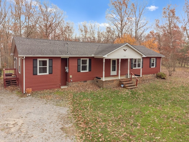 single story home featuring a front yard