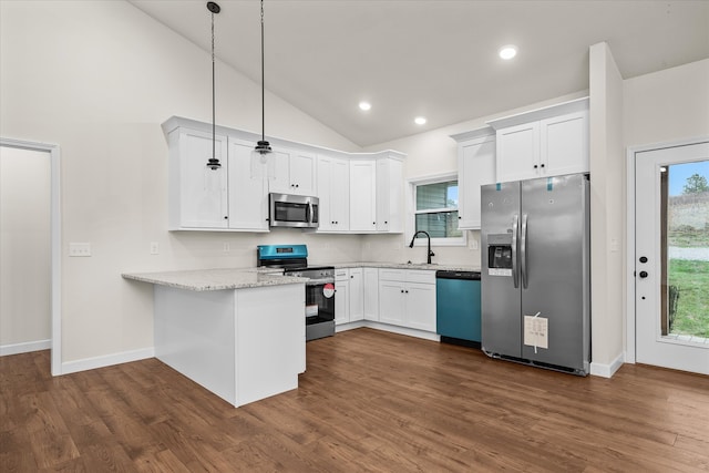 kitchen with white cabinets, decorative light fixtures, stainless steel appliances, and dark wood-type flooring