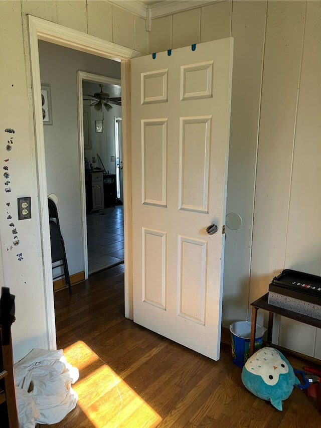 hallway with dark hardwood / wood-style floors