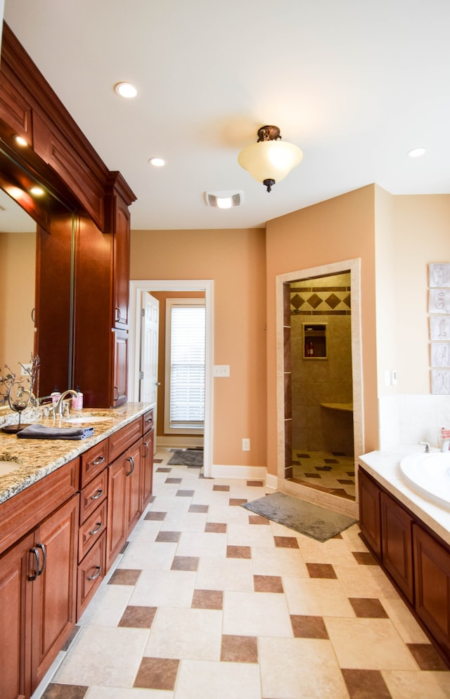 bathroom with shower with separate bathtub and vanity