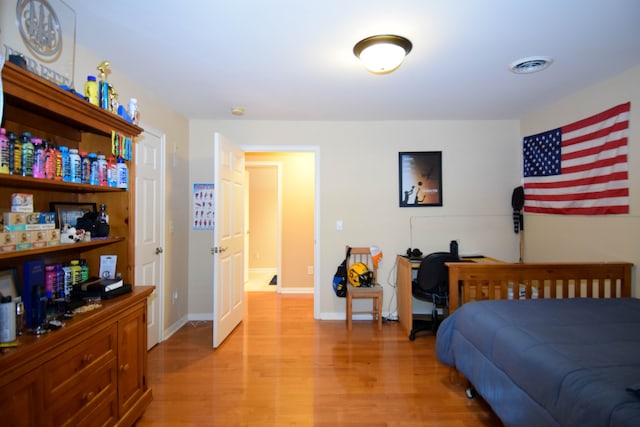 bedroom featuring light wood-type flooring