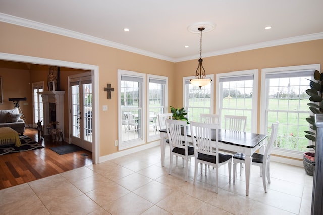 tiled dining space with crown molding