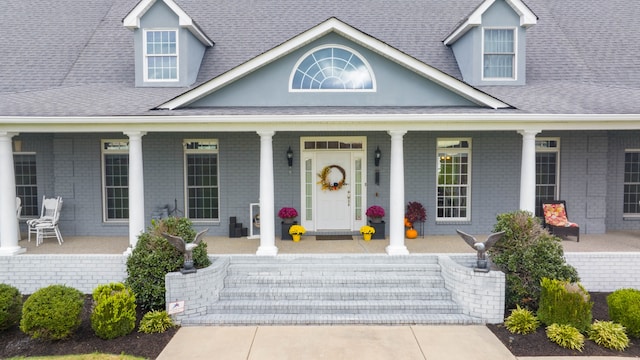 property entrance with a porch