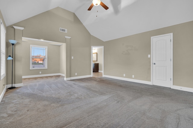 unfurnished living room featuring ceiling fan, high vaulted ceiling, and light colored carpet