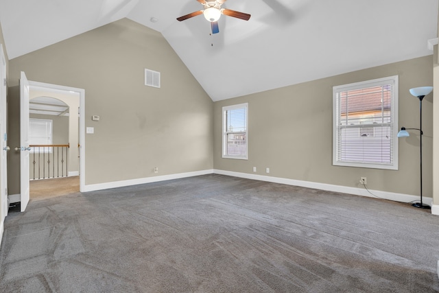 unfurnished living room featuring carpet, ceiling fan, and lofted ceiling