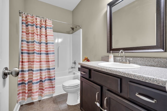 full bathroom with tile patterned flooring, shower / bath combo, toilet, and vanity