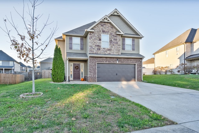 view of front of property with a garage and a front yard