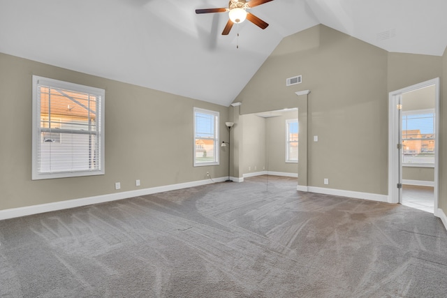 interior space featuring ceiling fan and high vaulted ceiling