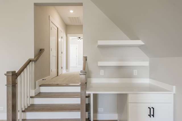 stairway with ceiling fan