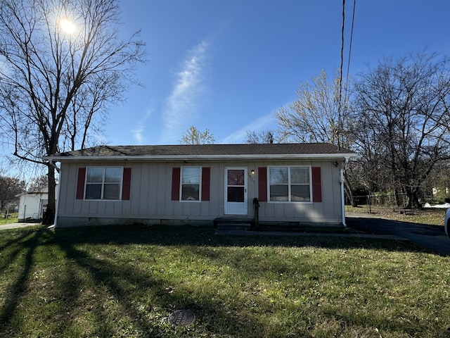 view of front of property with a front lawn