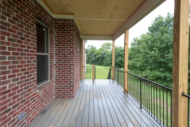 deck featuring a yard